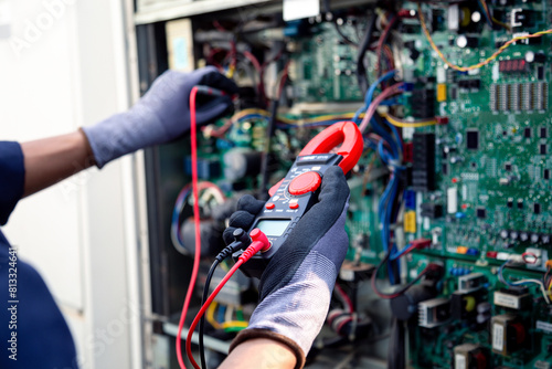 Air conditioning technicians and those preparing to install new air conditioners use a multimeter to check the operation of the compressor control panel system.