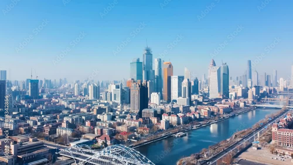 The Panoramic View Of Blue Sky Clouds Passing Over Midtown Commercial Residential Towers And Modern Skyscrapers Skyline Buildings Metropolis Scene City With Bridge Through River The Panoramic View Of Blue Sky Clouds Passing Over Midtown Commercial Residential Towers And Modern Skyscrapers Skyline Buildings Metropolis Scene City With Bridge Through River