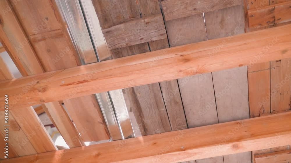Wooden shields from boards at a construction site. Primary wooden floor of the second floor of a private house, smooth camera movement Wooden shields from boards at a construction site. Primary wooden floor of the second floor of a private house, smooth camera movement