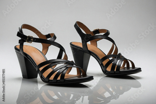 A stylish sandal in sleek black leather photo