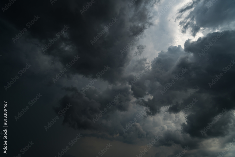Dark sky with stormy clouds. Dramatic sky rain,Dark clouds before a thunder-storm. Dark sky with stormy clouds. Dramatic sky rain,Dark clouds before a thunder-storm.