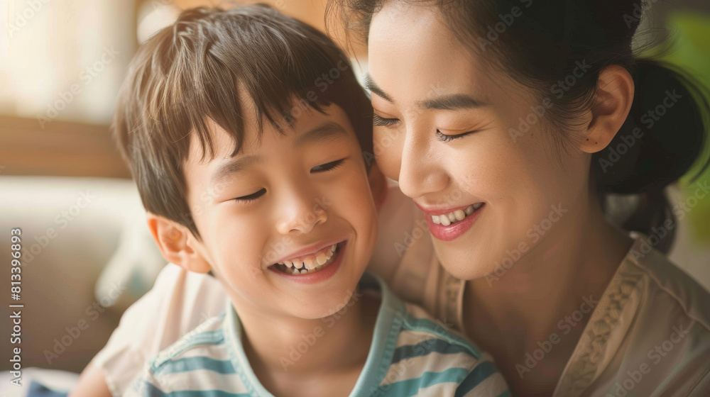 Affectionate moment between smiling Chinese mother and Chinese son at home, showcasing a warm, loving family dynamic Affectionate moment between smiling Chinese mother and Chinese son at home, showcasing a warm, loving family dynamic