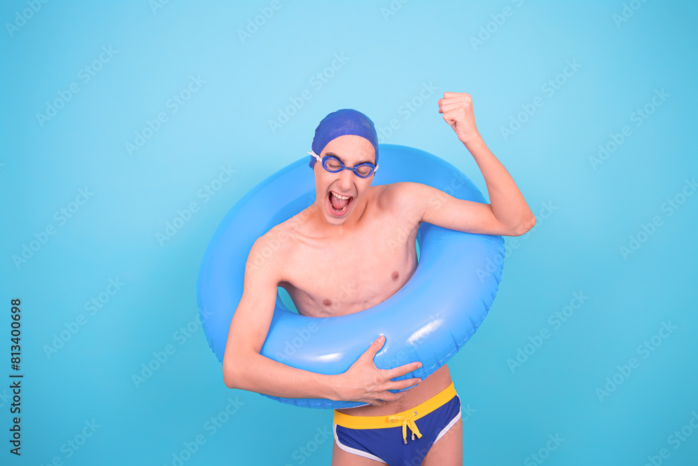 A funny guy who can't swim. A man is going to the pool. Blue background. A funny guy who can't swim. A man is going to the pool. Blue background.