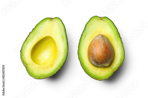 Two avocado halves with a pit