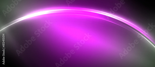 A captivating electric blue circle floating in midair, casting a mesmerizing magenta glow. The waterlike material property gives off a dazzling visual effect against the dark background photo