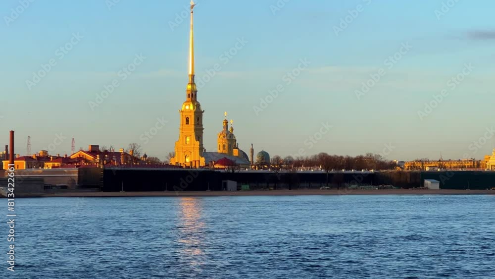St. Petersburg, Russia - April 20, 2024. View of the sights of the city from the Neva River embankment. Panoramic view of the Neva River and Peter and Paul Fortress, on Zayachy Island. 4К St. Petersburg, Russia - April 20, 2024. View of the sights of the city from the Neva River embankment. Panoramic view of the Neva River and Peter and Paul Fortress, on Zayachy Island. 4К