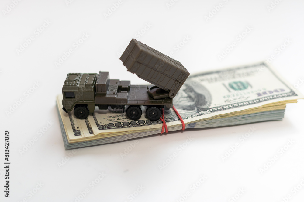 concept four rockets sent upwards against a hundred dollar banknote money background. Weapons of mass destruction, nuclear warhead, chemical charge. armament concept four rockets sent upwards against a hundred dollar banknote money background. Weapons of mass destruction, nuclear warhead, chemical charge. armament