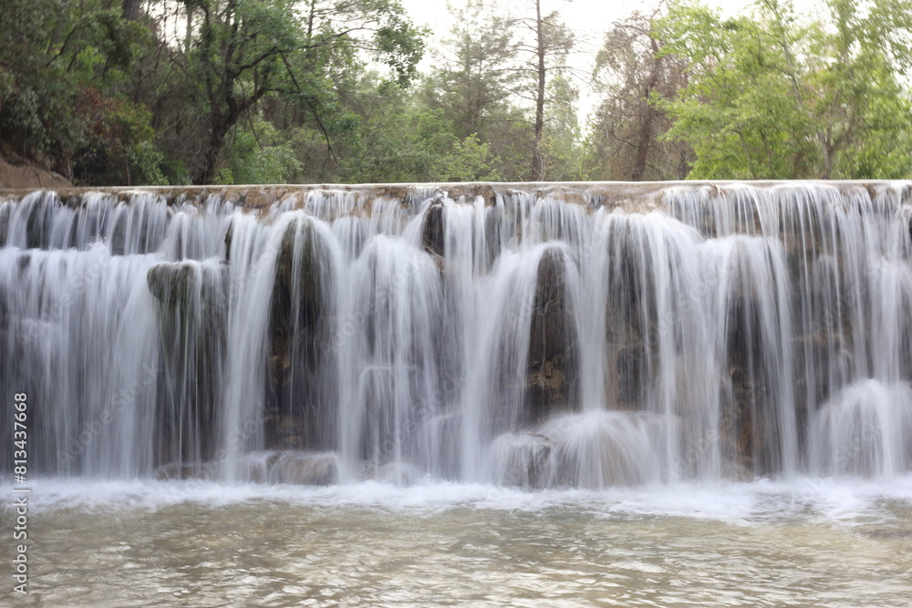 Obraz premium silky waterfall in the forest