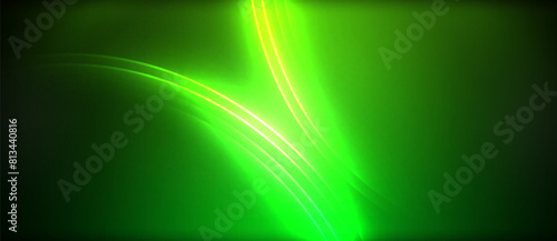 An electric blue lens flare creates a stunning contrast as it shines on a black background, illuminating a terrestrial plant in macro photography