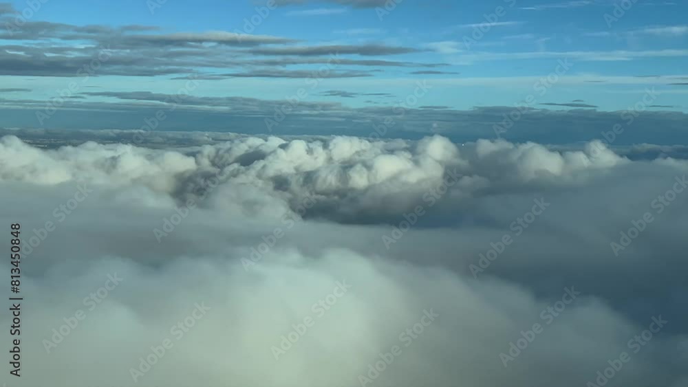 POV flying over the clouds with Madrid city at the back. Shot from an airplane cockpit. 4K 60FPS POV flying over the clouds with Madrid city at the back. Shot from an airplane cockpit. 4K 60FPS