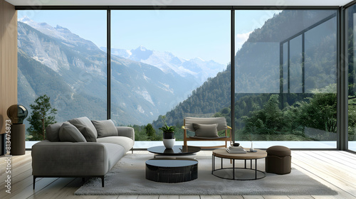 Sofa, chair and table in living room with window view of mountain