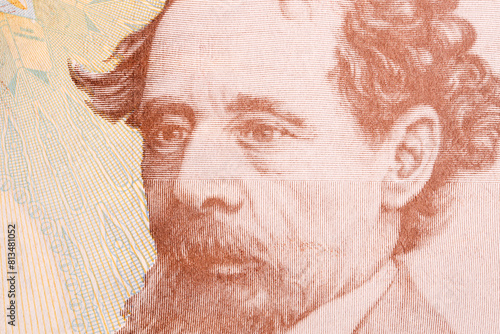 Charles Dickens a closeup portrait from English money photo