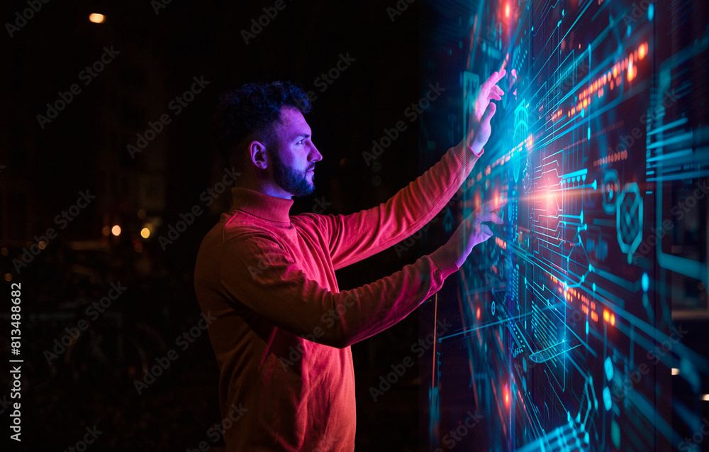 © Westend61 - Businessman touching and examining big blockchain data at night © Westend61 - Businessman touching and examining big blockchain data at night