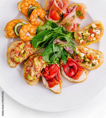 Gourmet bruschetta platter on white background