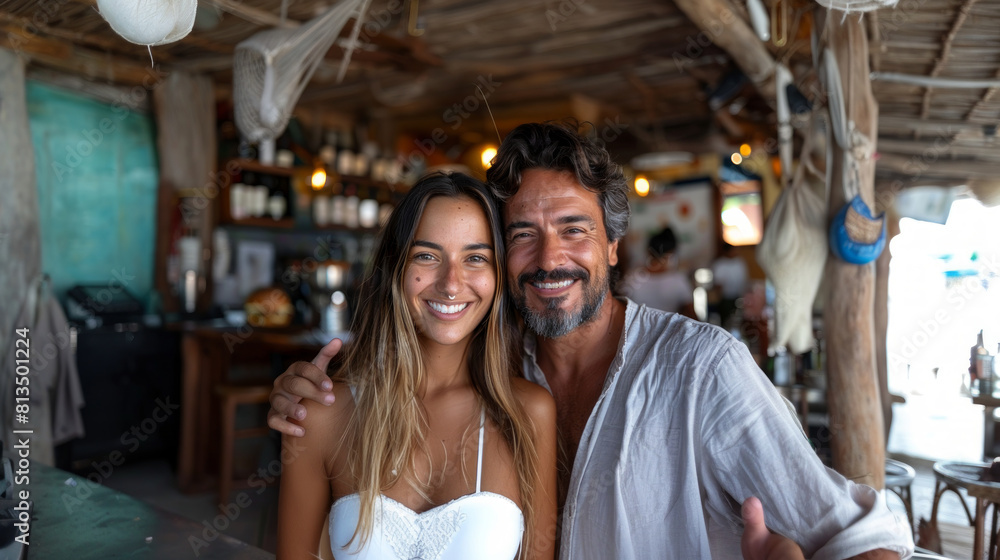 Happy Couple Enjoying Time Together at a Beach Bar, Taking a Selfie
