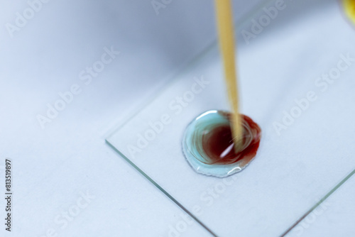 Blood group and rh factor testing by Doctor and Make a permanent slide In the Laboratory. 
