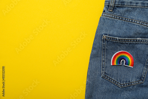 LGBT parade concept, free love symbol on yellow background.