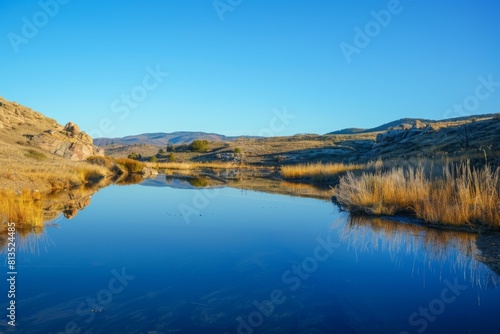 Serene Lake Reflections at Sunrise