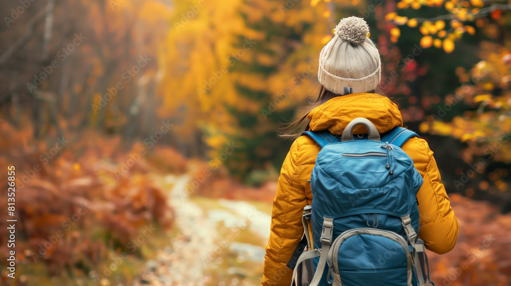 Woman Walking Down Path in Autumn Woman Walking Down Path in Autumn