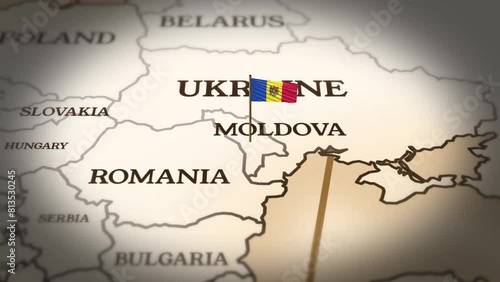 Moldova flag showing on world map with 3d rendering photo