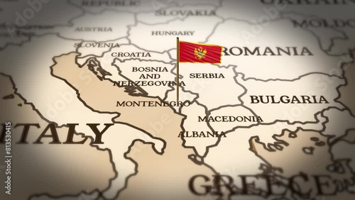 Montenegro flag showing on world map with 3d rendering photo