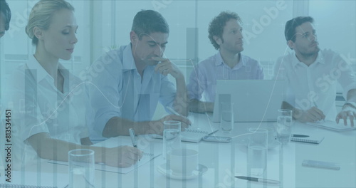 Image of financial data processing over diverse business people having meeting at office