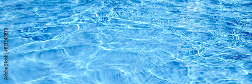 Crystal clear turquoise swimming pool water texture, ideal for summer and vacation themes, with a tranquil, refreshing vibe