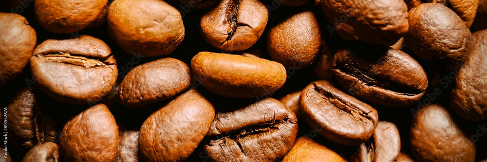 Close-up of roasted coffee beans, perfect for International Coffee Day themes and food and beverage industry content Close-up of roasted coffee beans, perfect for International Coffee Day themes and food and beverage industry content