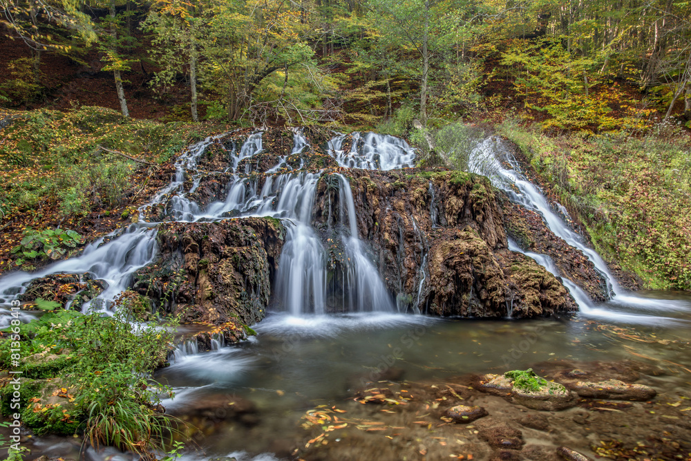 Beautiful shot of cascade waterfalls in a forest Beautiful shot of cascade waterfalls in a forest