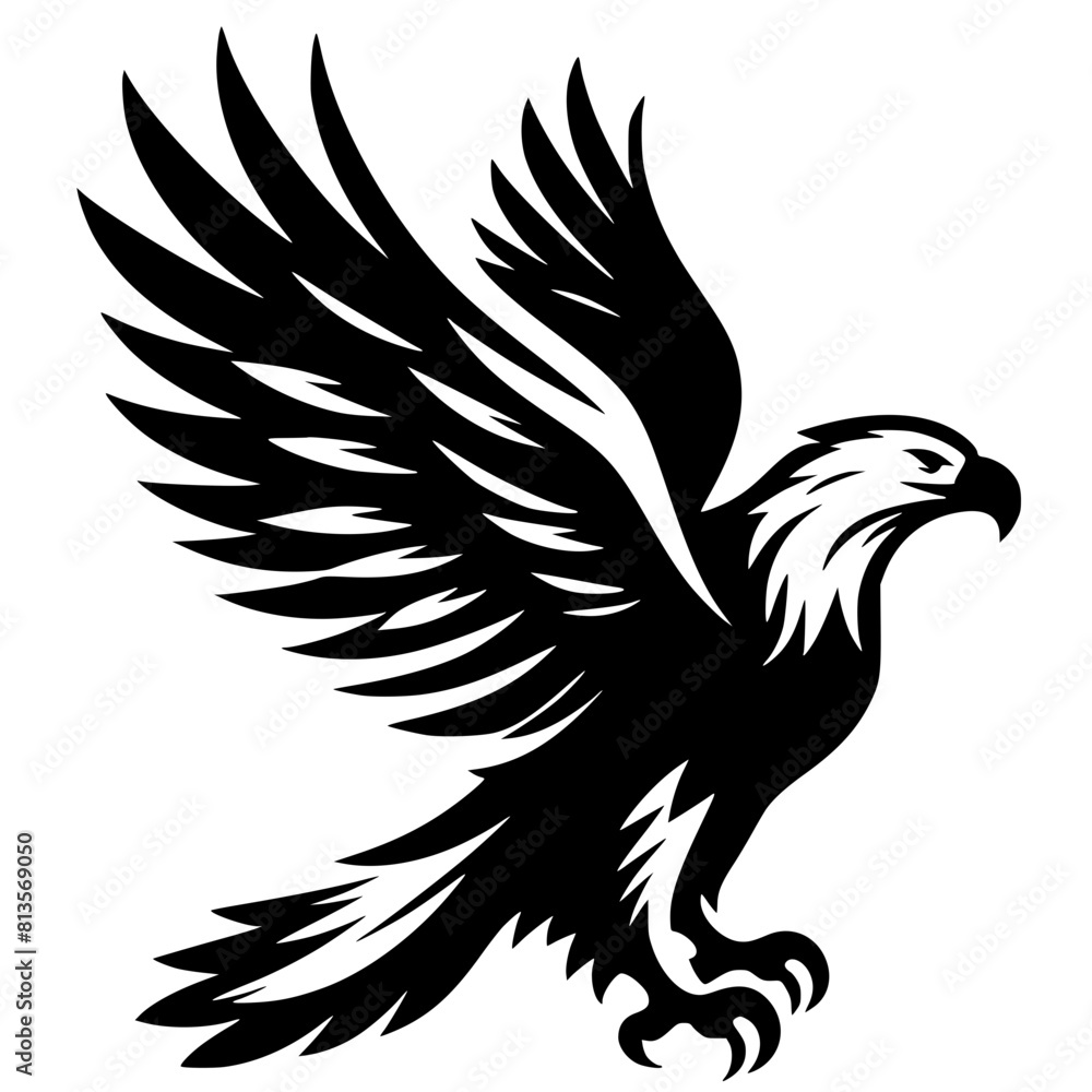 Obraz premium Silhouette of an eagle flapping its wings