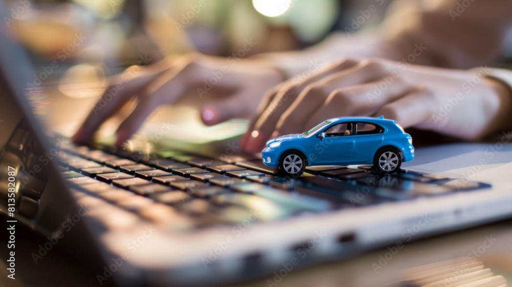 Miniature Car on Computer Keyboard Miniature Car on Computer Keyboard