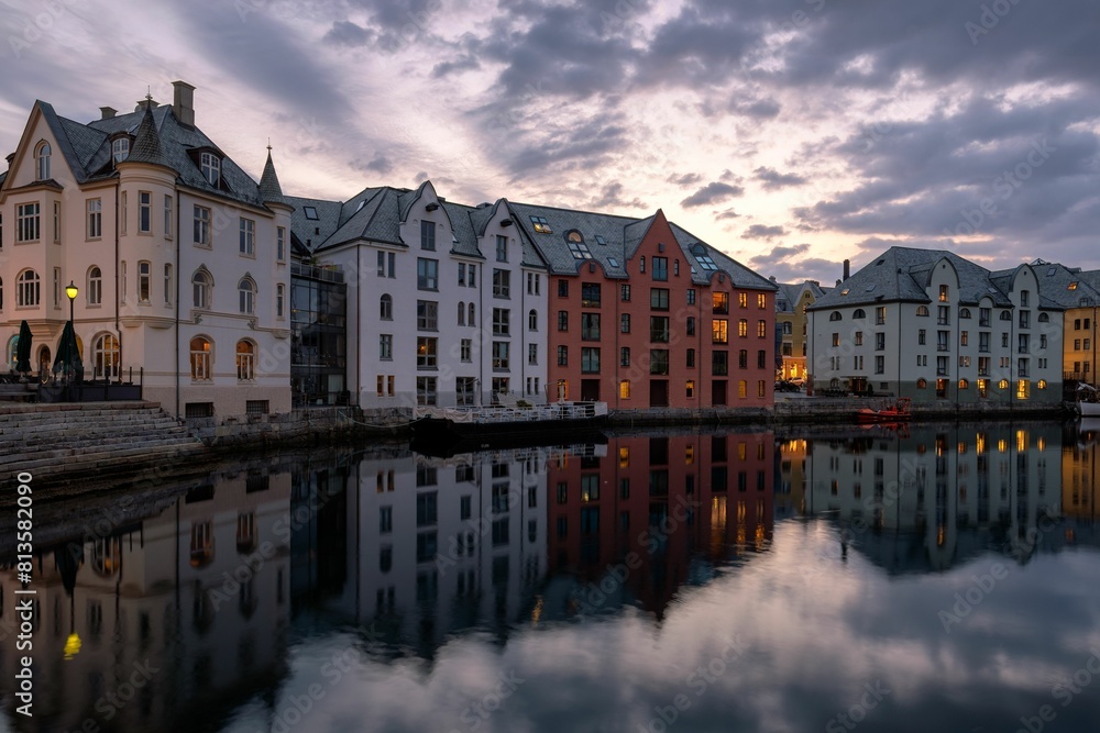 Fototapeta premium Beautiful view of old buildings with reflection on a river