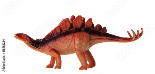 Realistic plastic model of a Stegosaurus dinosaur on white background.