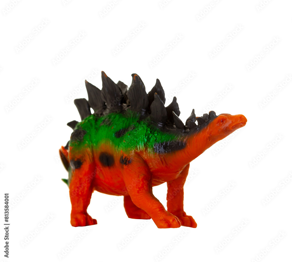 Realistic plastic model of a Stegosaurus dinosaur on white background.