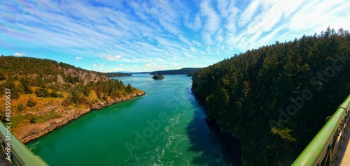 View of a forest with a lake from the bridge of Deception Pass in Washington State photo