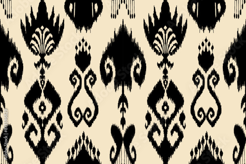Ikat paisley embroidery on the fabric in Indonesia,India and asian countries.geometric ethnic oriental seamless pattern.Aztec style. illustration.design for texture,fabric,clothing,wrapping,carpet photo