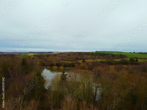 Aerial view of an autumn forest with Lyons lake in Hetton photo