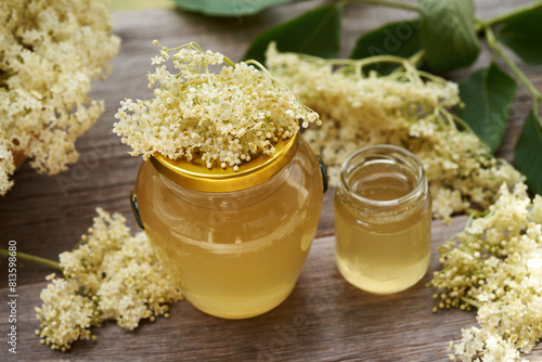 Two jars of homemade elderberry flower syrup