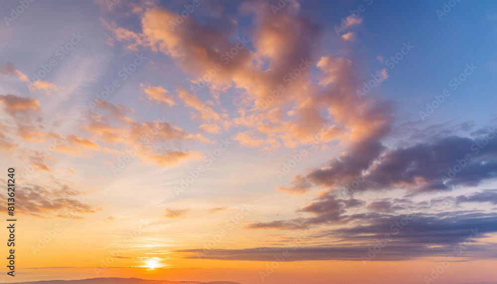 Real majestic sunrise sundown sky background with gentle colorful clouds.