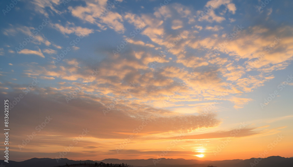 Real majestic sunrise sundown sky background with gentle colorful clouds. Real majestic sunrise sundown sky background with gentle colorful clouds.