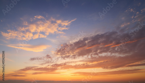 Real majestic sunrise sundown sky background with gentle colorful clouds. © Sitthikorn