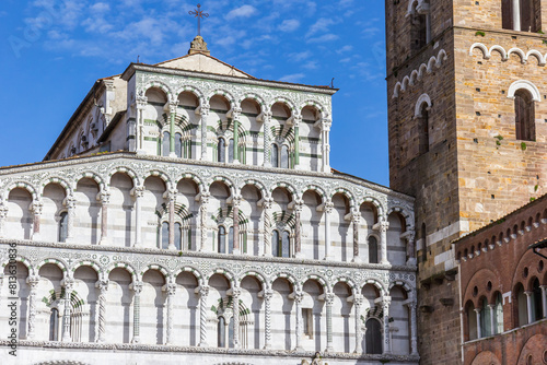 Tower and facade of the Duomo cathedral in Lucca, Italy