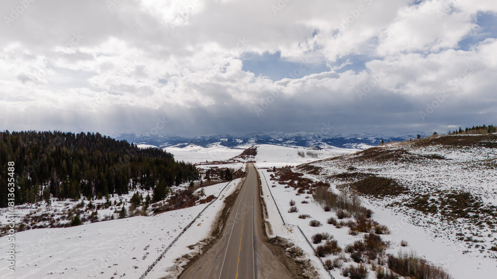 scenic highway through snow-capped mountains. Drone photo scenic highway through snow-capped mountains. Drone photo