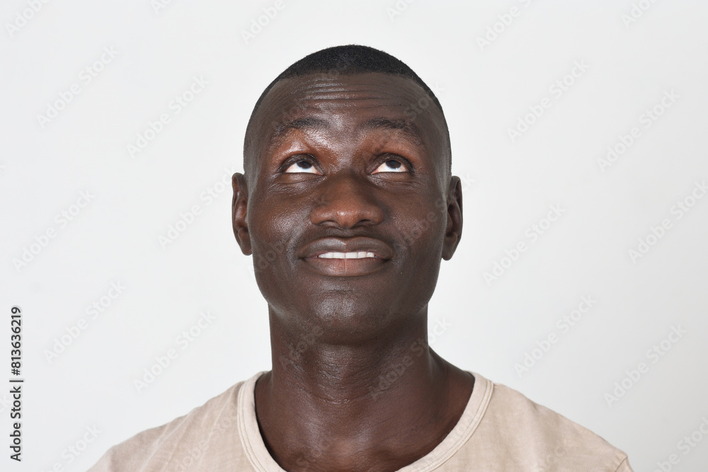front face portrait of a man looking up on white background front face portrait of a man looking up on white background