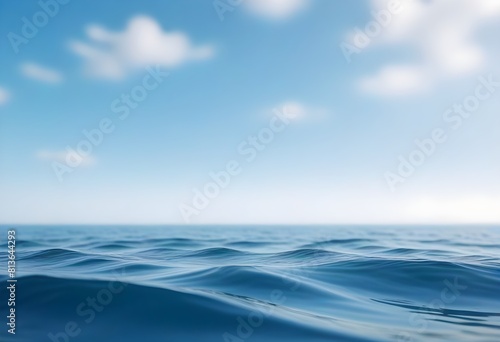 A vast blue ocean under a sky filled with fluffy white clouds