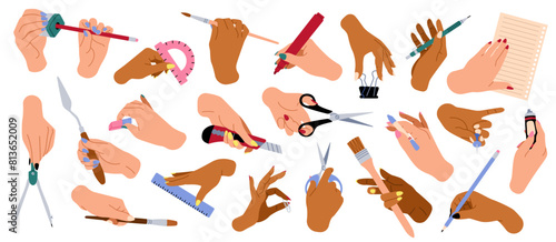 Hands holding writing supplies. Human arms with stationery, scissors, cutters and sharpeners, brush and paint, different finger positions, cartoon flat style isolated tidy vector set © YummyBuum