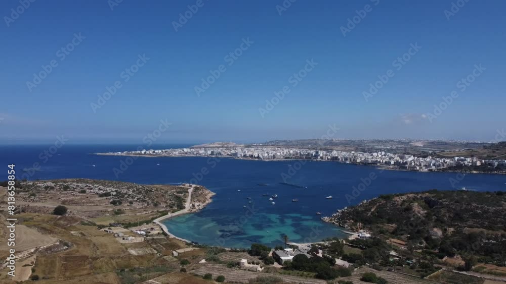 Mistra bay and Selmun peninsula agricultural terraced fields, secluded beach view from the Selmun palace. Aerial shot. High quality 4k footage Mistra bay and Selmun peninsula agricultural terraced fields, secluded beach view from the Selmun palace. Aerial shot. High quality 4k footage