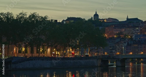 Lyon city riverfront and river at night. France photo