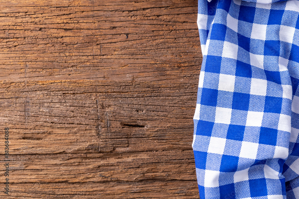 blue tablecloth on wooden table blue tablecloth on wooden table