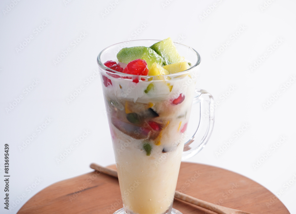 Thai desserts: Crispy pomegranate and Thai melon, fresh coconut milk in a glass